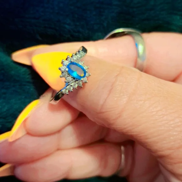 925 Blue Topaz Diamond Ring